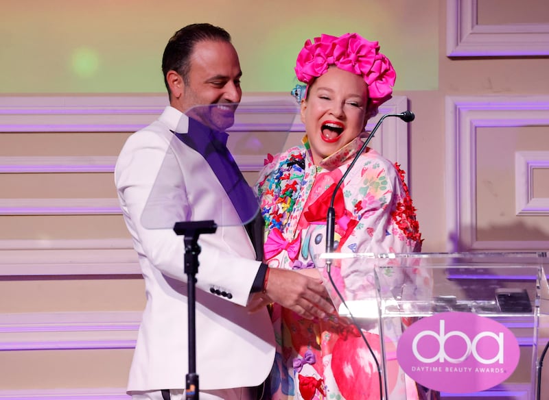 Singer Sia (right) in with plastic surgeon Ben Talei at the 5th Daytime Beauty Awards on October 1, 2023. According to Griffin, Sia's before-and-after photos compelled her to seek treatment from Dr. Talei.