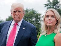 President Donald Trump, joined by White House Press Secretary Karoline Leavitt, speaks to the media as he departs the White House on July 15, 2025 in Washington, DC.