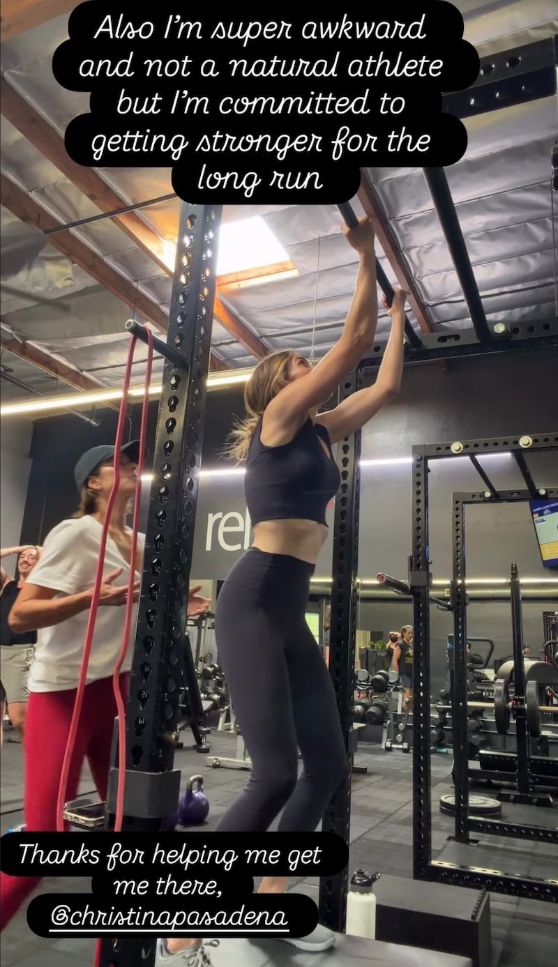 Mandy Moore shares a fitness video on her Instagram story, in which she does a pull-up and other exercises.