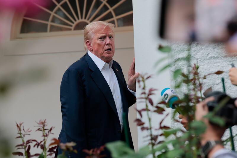 President Donald Trump speaks to reporters near the Rose Garden after returning to the White House on Marine One on July 29, 2025 in Washington, DC.