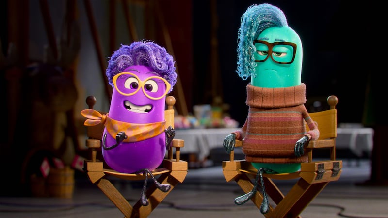Paula Persimmon, voice of Paula Pell, and Xeni, voice of Richard Ayoade, in Dream Productions.
