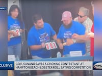 New Hampshire Gov. Chris Sununu comes to the rescue of a lobster-eating contest participant.