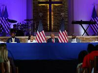 Donald Trump speaks during a campaign community roundtable at 180 Church in Detroit.