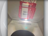 American Airlines flight attendant Estes Carter Thompson III allegedly taped his iPhone to a toilet lid to secretly film a 14-year-old girl using the lavatory.