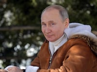 2021-03-21T122253Z_1579057597_RC2OFM9AM043_RTRMADP_3_RUSSIA-PUTIN_nh9f2e