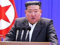 Kim Jong Un delivers a speech at the inauguration of the Samgwang Stockbreeding Farm in North Pyongan Province, North Korea. A state-run media agency released the photo.