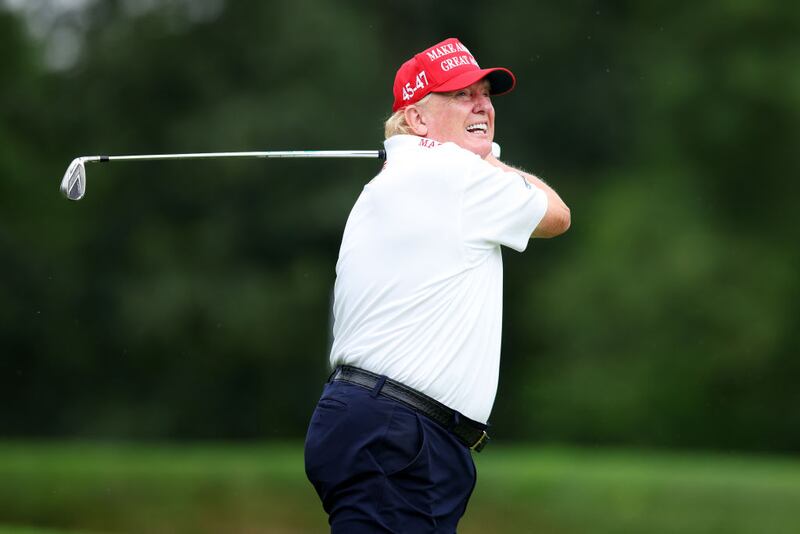 BEDMINSTER, NEW JERSEY - AUGUST 10: Former President Donald Trump follows his tee shot on the 3rd tee during the pro-am prior to the LIV Golf Invitational - Bedminster at Trump National Golf Club on August 10, 2023 in Bedminster, New Jersey. (Photo by Mike Stobe/Getty Images)