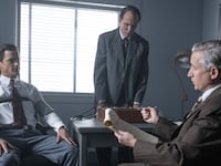 Matt Bomer as Hawkins "Hawk" Fuller takes a lie detecter test in a still from Fellow Travelers.
