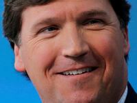 Fox personality Tucker Carlson speaks at a 2017 conference.
