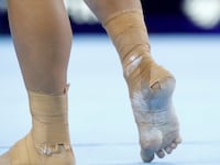 2019-10-13T134252Z_587765966_RC18C3FDF200_RTRMADP_3_GYMNASTICS-WORLD_pz9smc