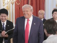 U.S. President Donald Trump smiles as he greets Japanese citizens who North Korea has abducted during a meeting with Japanese Prime Minister Sanae Takaichi at Akasaka Palace on October 28, 2025 in Tokyo, Japan.