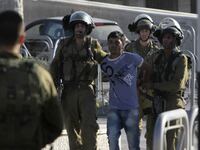 articles/2013/08/26/west-bank-clashes-leave-three-dead-threatening-peace-talks/OZ_Qalandiya_riots_ahjezr