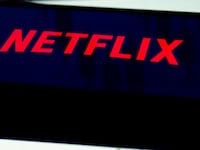 In this photo illustration, a Netflix logo is seen displayed on a smartphone.