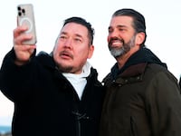 A wellwisher takes a picture with US businessman Donald Trump Jr. after arriving in Nuuk, Greenland on January 7, 2025. Donald Trump Jr made a private visit to Greenland, a Danish autonomous territory coveted by Trump Sr and which hopes to one day be independent but remains dependent on Copenhagen for now. (Photo by Emil Stach / Ritzau Scanpix / AFP) / Denmark OUT (Photo by EMIL STACH/Ritzau Scanpix/AFP via Getty Images)