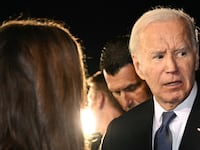 President Joe Biden speaks to supporters gathered on the tarmac upon his arrival at Raleigh-Durham International Airport in Morrisville, North Carolina, early on June 28, 2024.