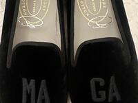 An Instagram story by Bettina Anderson shows off a new pair of custom MAGA slippers.