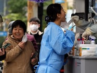 2022-12-07T070741Z_1709313039_RC2U0Y92Q7KP_RTRMADP_3_HEALTH-CORONAVIRUS-CHINA_ka6hlt