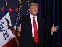 Republican presidential candidate, former President Donald Trump arrives at a campaign event at the Hyatt Hotel on December 13, 2023 in Coralville, Iowa.