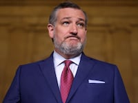Sen. Ted Cruz speaks to reporters outside the Russell Senate Office.