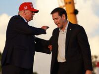 Former U.S. President Donald Trump stands with Sen. Marco Rubio (R-FL)
