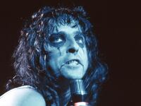 articles/2014/05/30/exclusive-the-true-story-behind-alice-cooper-s-chicken-incident-and-the-birth-of-shock-rock/140529-stern-alice-cooper-tease_jky6oe