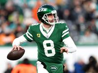 EAST RUTHERFORD, NEW JERSEY - JANUARY 05: Aaron Rodgers #8 of the New York Jets in action against the Miami Dolphins at MetLife Stadium on January 05, 2025 in East Rutherford, New Jersey. (Photo by Luke Hales/Getty Images)