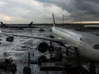 A summer storm passes over the Delate Airlines terminal at John F. Kennedy Airport on June 30, 2024, in the borough of Queens, New York City, New York.
