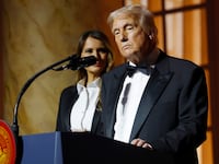 Donald Trump and Melania Trump at a dinner