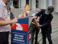 2020-08-31T165944Z_965436868_RC24PI9PRTZP_RTRMADP_3_USA-ELECTION-POST-OFFICE_sz4wvr