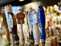 Beer taps in Georgetown bar, Washington, DC.