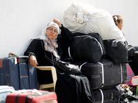 articles/2013/09/26/imprisonment-of-two-canadian-activists-illustrates-egyptian-regime-s-growing-repression/OZ_Rafah_crossing_a7pzpc