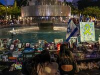 Relatives and friends of the Israeli hostages gather around a memorial set up for the hostages taken by Hamas in Hamedina Square in Tel Aviv, Israel, on May 12, 2024.