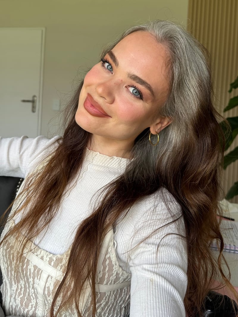 Chanelle does not want to dye her hair gray because she wants to go through the natural process of letting go of her brunette hair.