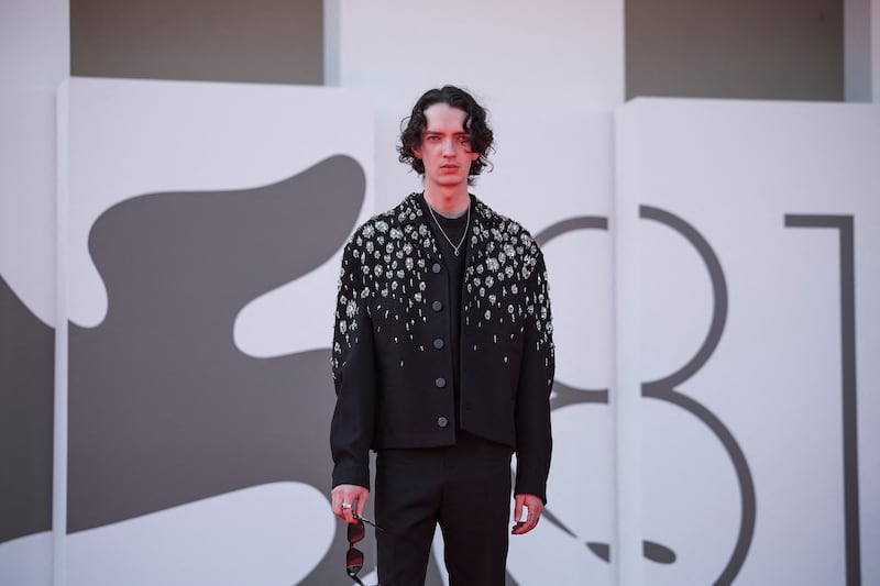 Kodi Smit-McPhee poses on the red carpet during the Venice Film Festival on August 29, 2024.