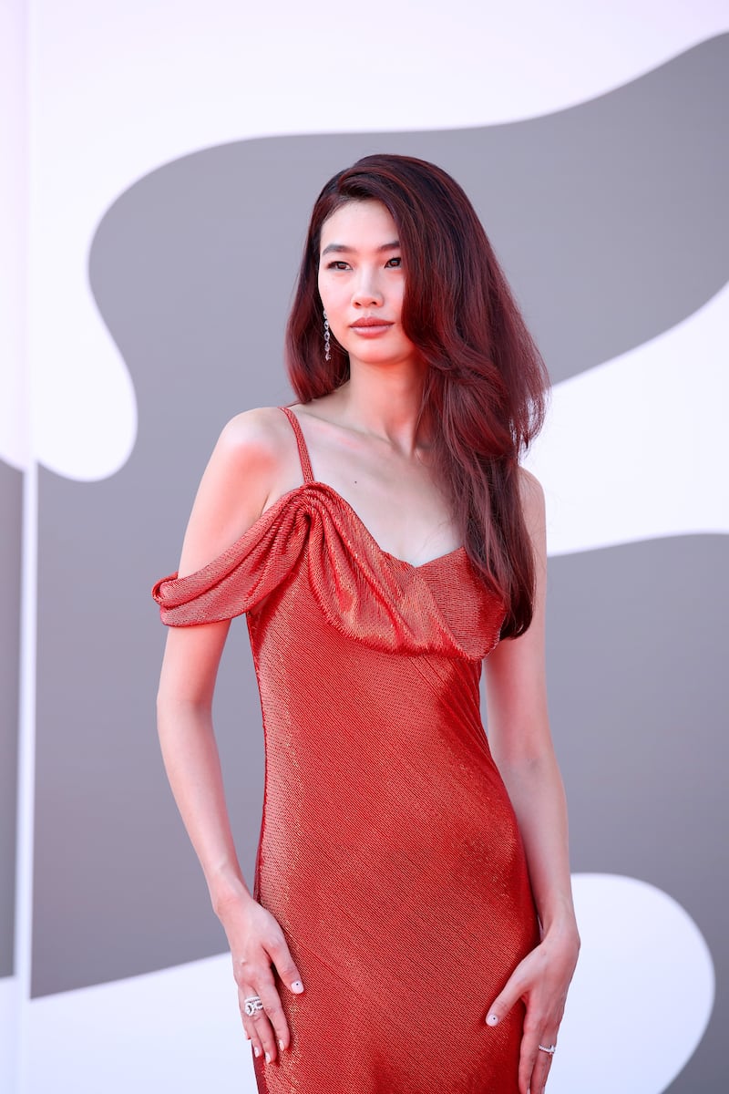 Hoyeon Jung poses on the red carpet during the Venice Film Festival on August 29, 2024.