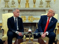 President Donald Trump (R) meets with Canadian Prime Minister Mark Carney in the Oval Office at the White House on May 6, 2025 in Washington, DC.