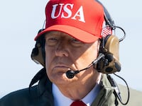 TOPSHOT - US President Donald Trump visits the USS George H.W. Bush aircraft carrier which is out at sea near Norfolk, Virginia, October 5, 2025, as he travels to see a Naval demonstration as part of the US Navy's 250th anniversary celebration, "America's Navy 250: Titans of the Sea - A Salute to the Fleet". (Photo by SAUL LOEB / AFP) (Photo by SAUL LOEB/AFP via Getty Images)
