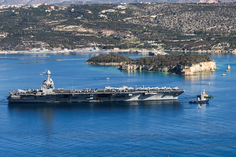 TOPSHOT - The US Navy aircraft carrier USS Gerald R. Ford departs Souda Bay on the island of Crete on February 26, 2026.