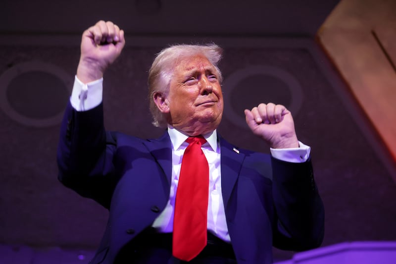 President Donald Trump dances to the final performance of the Village People during the FIFA World Cup 2026 Official Draw at John F. Kennedy Center for the Performing Arts on December 05, 2025 in Washington, DC.
