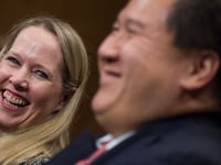 James C. Ho, nominee to be a judge for the 5th U.S. Circuit Court of Appeals, appears with his wife Allyson in 2017.