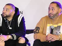 A photo of DJ Envy and Cesar Piña.