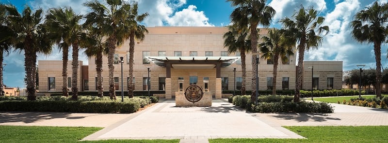 Palm trees line the U.S. embassy in Malta.