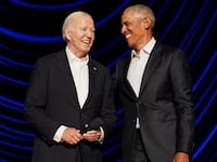 President Joe Biden and former President Barack Obama share a laugh during a star-studded campaign fundraiser at the Peacock Theater in Los Angeles, California, June 15, 2024.