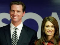 SAN FRANCISCO - DECEMBER 8: Former U.S. President Bill Clinton (L) speaks at a campaign rally for San Francisco mayoral candidate Gavin Newsom (C) as Newsom's wife Kimberly Guilfoyle-Newsom (R) looks on December 8, 2003 in San Francisco, California. Newsom is facing a run-off election against Green Party candidate Matt Gonzalez on December 9th. (Photo by Justin Sullivan/Getty Images)