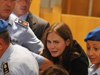 articles/2011/10/03/amanda-knox-leaves-prison-a-free-woman-after-judge-orders-her-release/knox-released-nadeau_xqrzma