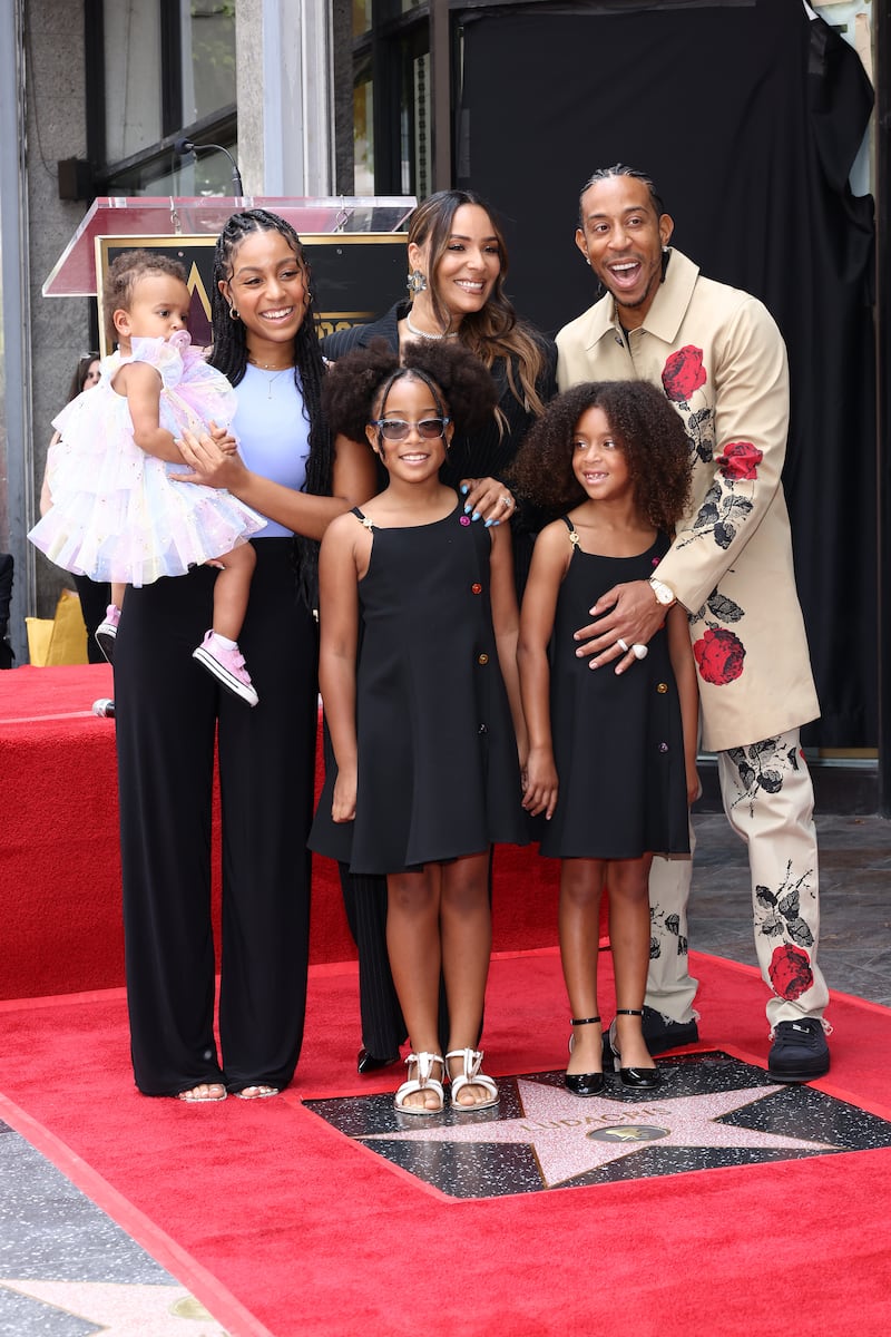 Ludacris, with his four daughters and wife Eudoxie Mbouguiengue, at the Hollywood Walk of Fame ceremony on May 18, 2023, in Hollywood, California.