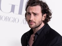 Aaron Taylor-Johnson on a red carpet.