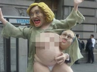 articles/2016/10/18/the-mystery-of-the-artist-behind-naked-hillary/161018-ryan-hillary-statue-tease_joht0w