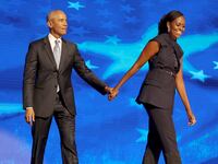 DNC CHICAGO, IL AUGUST 20, 2024 Former President Barack Obama and former first lady Michelle Obama on stage during the Democratic National Convention Tuesday, Aug. 20, 2024, in Chicago. (Robert Gauthier/Los Angeles Times via Getty Images)