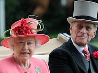 Queen Elizabeth ll and Prince Philip, Duke of Edinburgh arrive in an open carriage on Ladies Day at Royal Ascot on June 16, 2011 in Ascot, United Kingdom.
